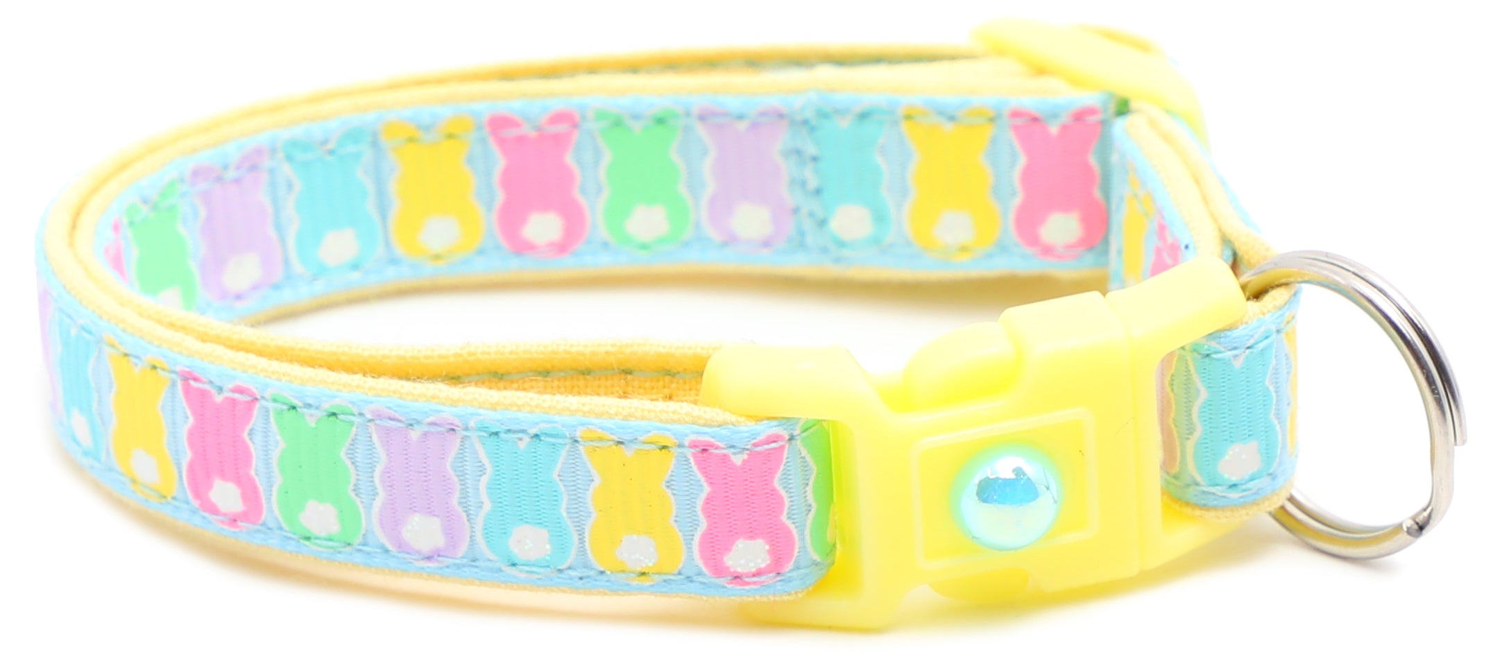 A colorful Marshmallow Easter Bunnies Breakaway Cat Collar featuring cute bunny designs, made from reinforced cotton with a breakaway clip.